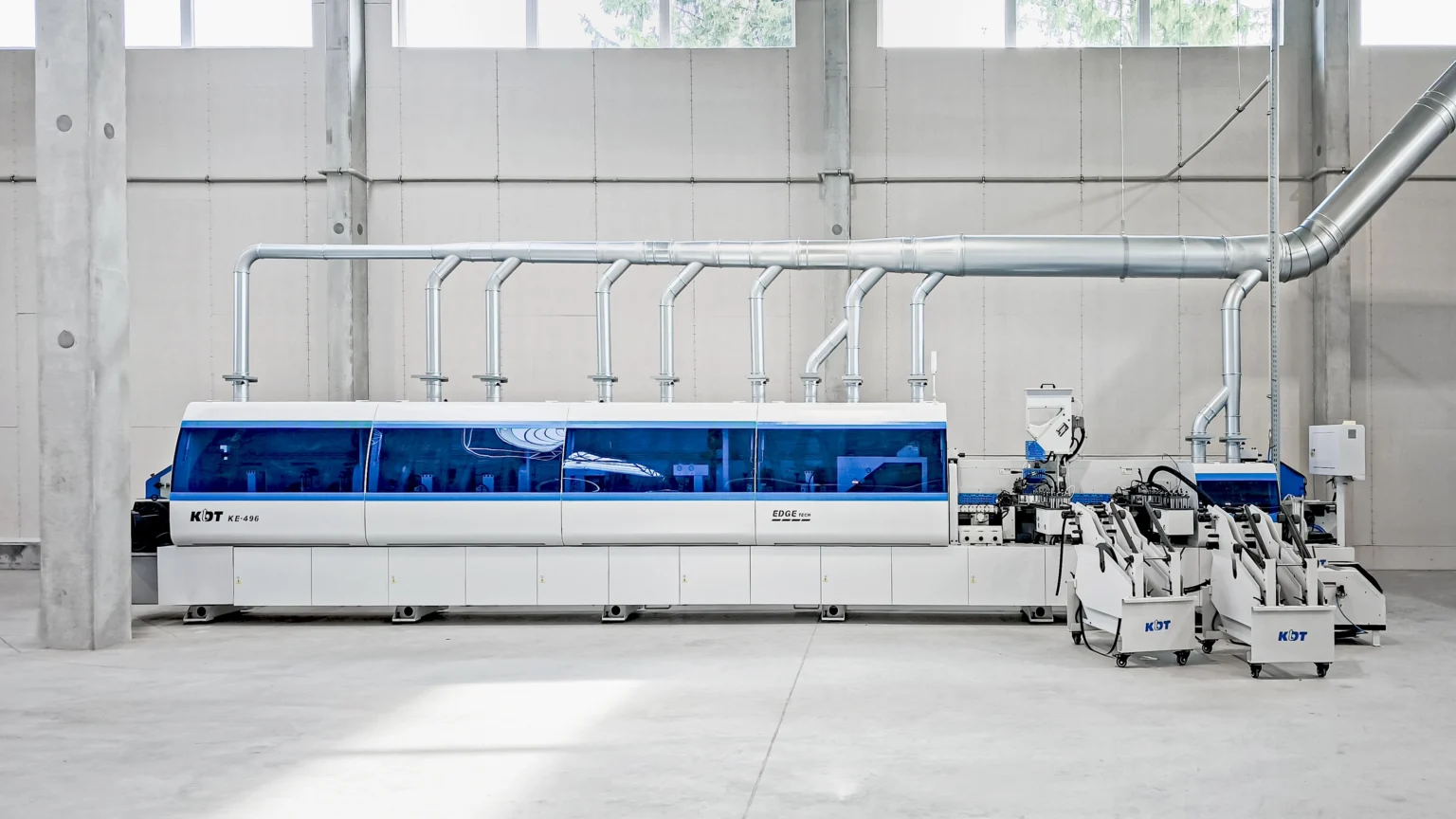 Industrial edge banding of laminated furniture board components at Drew-Bak
